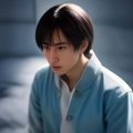 资深内容编辑老陈的工作照，戴眼镜、正在电脑前整理男人看片网站分类资料，表情专注